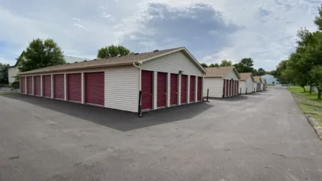 Storage facility with multiple units along a smooth paved road.