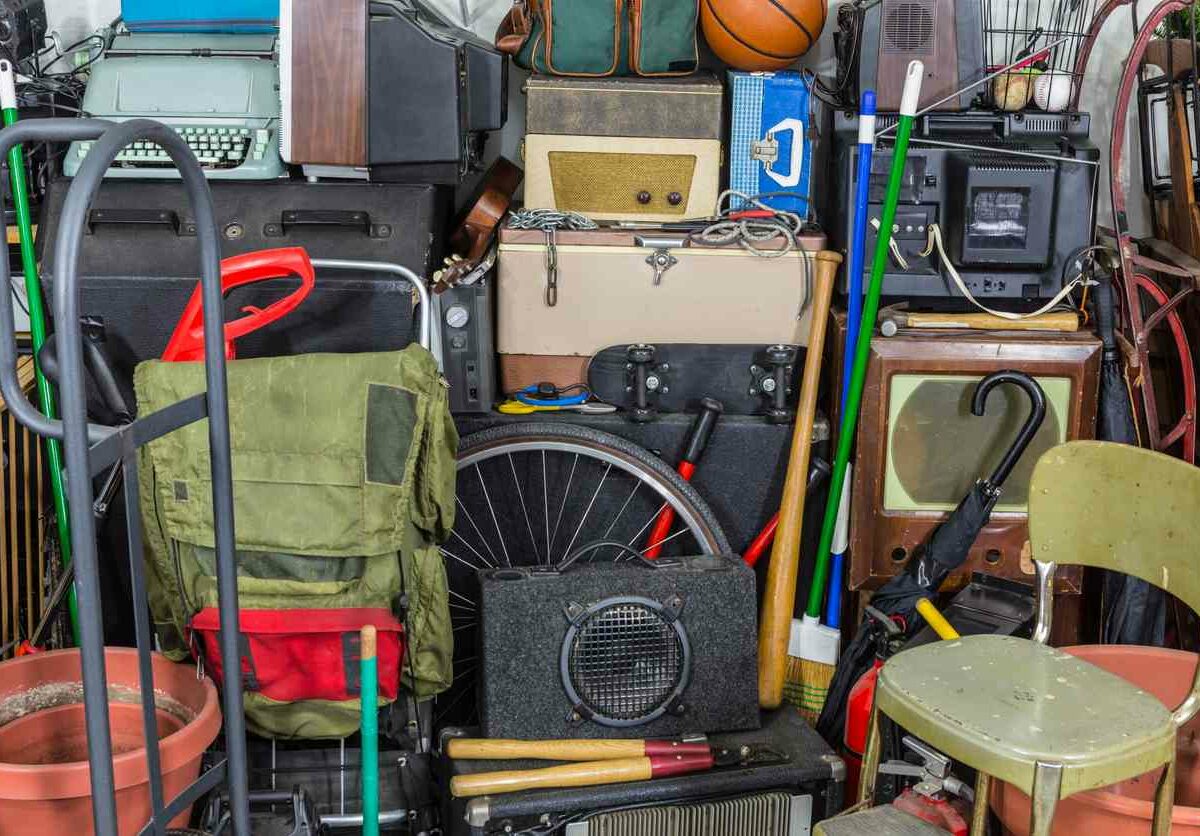 A space is cluttered with items stacked closely together
