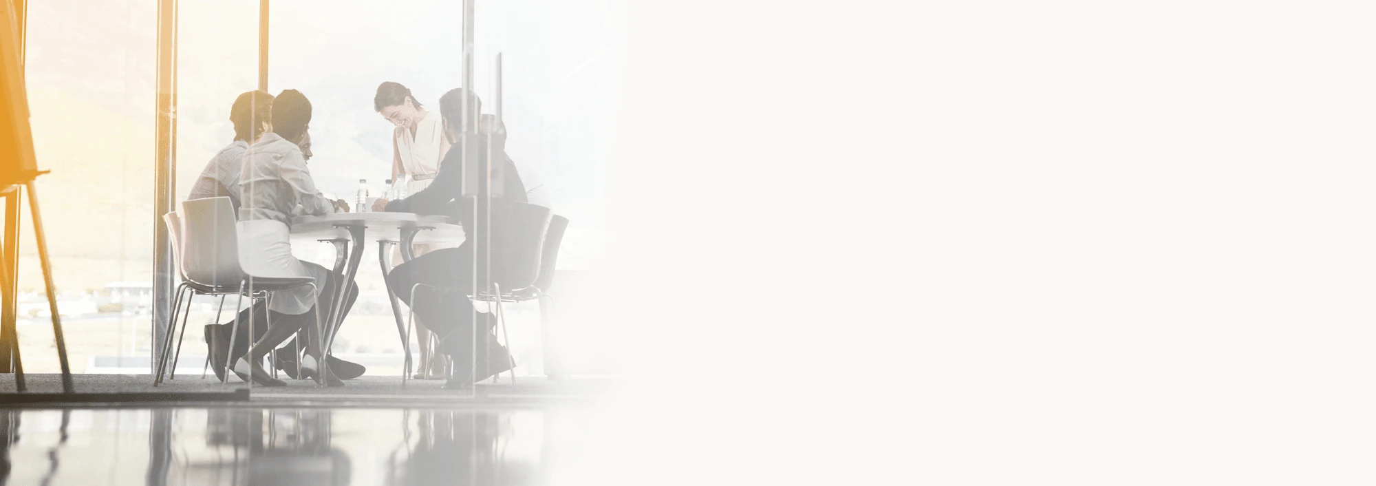 A group of coworkers collaborating in a conference room.