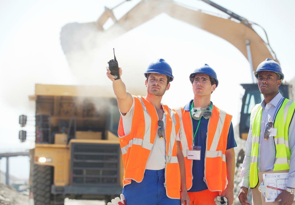 Construction workers outside.