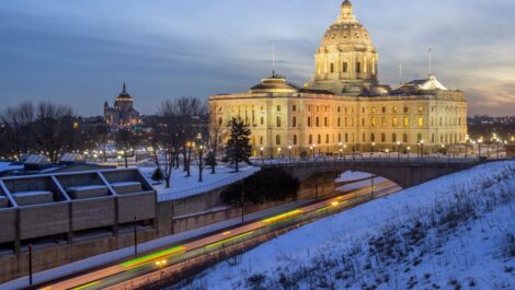 A beautifully lit State Capitol in St. Paul Minnesota at dusk.
