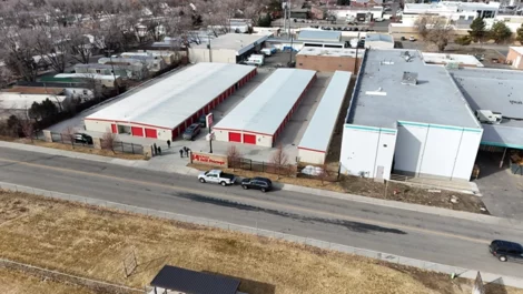 Aerial shot of a spacious storage facility with multiple rows of units.