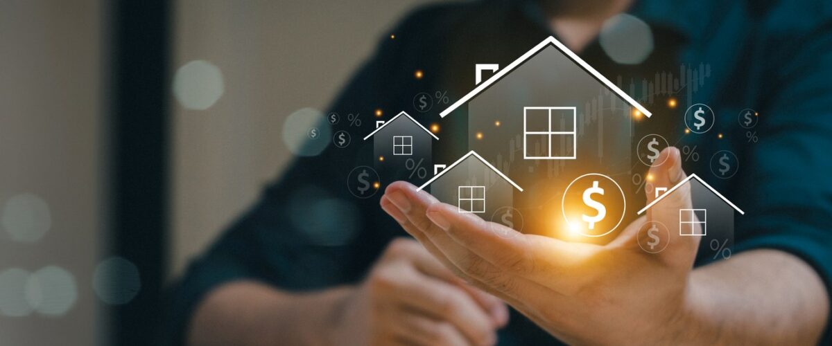 Man holding out his hand with an illustration of a house coming out to visualize real estate.